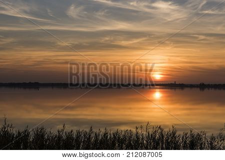 Belterwijde of the National Park Weerribben Wieden at sunset in autumn.