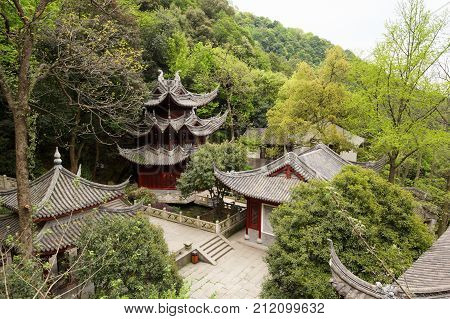Traditional clay roof of ancient chinese Lingyin temple, closeup