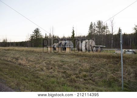 Big empty cable rools in the nature