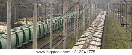 Railway station. Wagons with goods on railroad. Heavy industry.