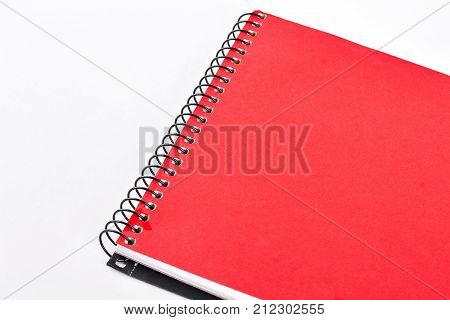 Red notepad on white background. Red notebook or writing pad isolated on white background. Craft paper notebook.