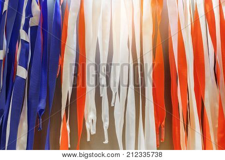 Blue white and red nylon ribbons decorated in department store for background