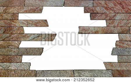 The wall of natural stone, grunge frame, white background close-up