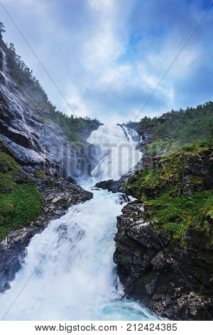 kjosfossen waterfall by the Flam to myrdal flamsbana railway line, Norway