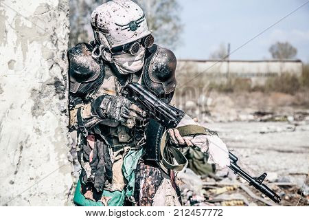 Post apocalyptic survivor creature with homemade weapons