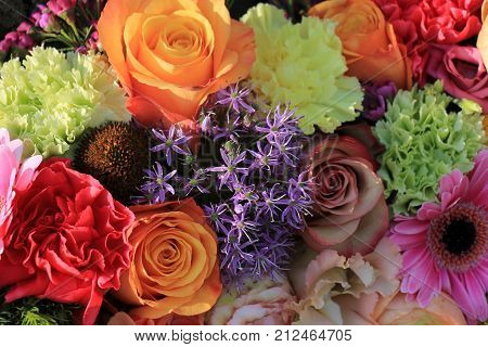 Mixed flower arrangement: various flowers in different pastel colors for a wedding