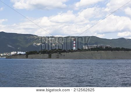 Lighthouse on a rocky shore Cape Tolstoy in the city resort Gelendzhik, Krasnodar region, Russia