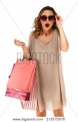 Shocked Shopping Woman With Shopping Bags