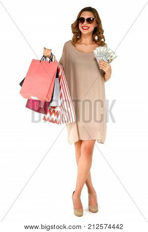 Shopper Woman With Multicolored Packages And Money In Hand