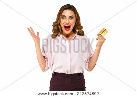 Excited Woman With Gold Credit Card In Hand On White Isolated Background