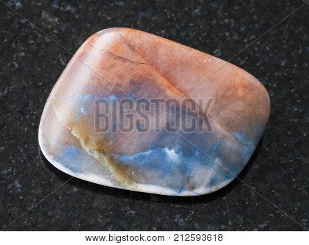 Tumbled Irnimite Gemstone On Dark Background
