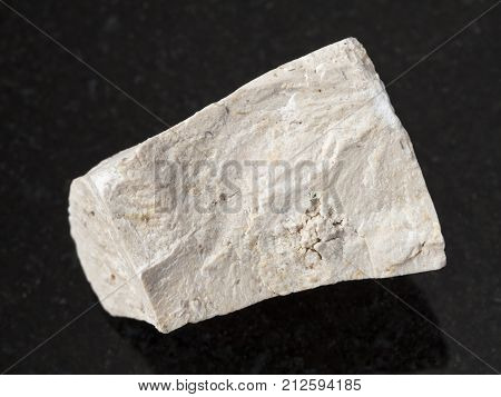 Raw Chemical Limestone Stone On Dark Background