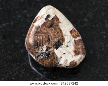 Tumbled Spreustein With Microcline Stone On Dark