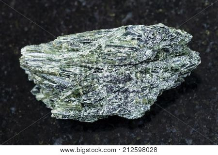 Raw Actinolite Stone On Dark Background