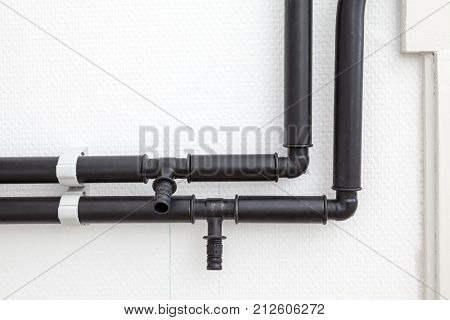 These plastic tubes are from the heating supply and return