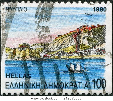 GREECE - CIRCA 1990: Postage stamps printed in Greece shows Nauplia Bourtzi with Palamidi in the background circa 1990