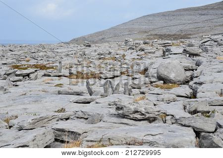 Beautiful Landscape In Burren Ireland With Gray Rocks And Blue Skies