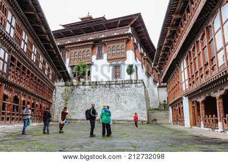 Trongsa, Bhutan - September 13, 2016: Tourist Group In The Courtyard Of Trongsa Dzong, Bhutan