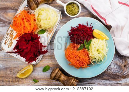 Assortment of vegetables noodles. Homemade raw fresh zucchini, carrot and beet root pasta