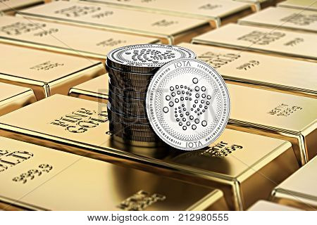 IOTA coins laying on stacked gold bars (gold ingots) rendered with shallow depth of field. Concept of highly desirable cryptocurrency. 3D rendering
