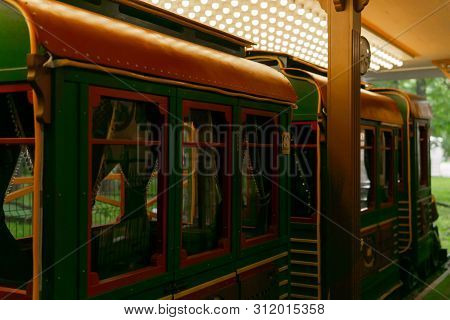 Miniature Railway Carriages In Retro Style At The Station Of The Narrow Gauge Railway In Amusement P