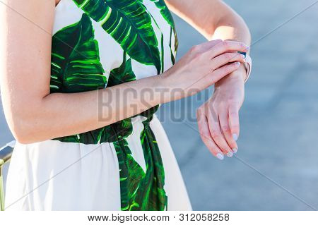 Female Touching Her Smartwatch. Detail View Tech Gear.