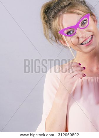 Happy Woman Holding Paper Decoration Photo Booth Mask Glasses On Stick, Having Fun. Wedding, Birthda