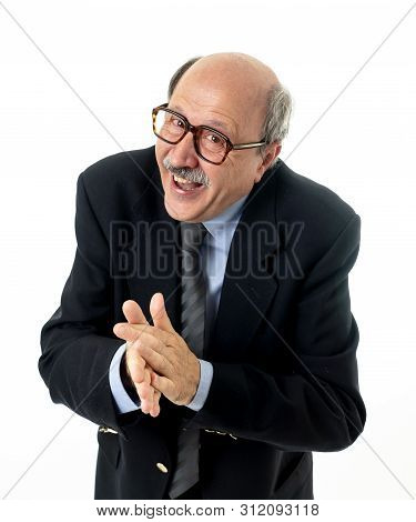 Portrait Of Last Day At Work Of Happy Senior Businessman Excited About His Retirement