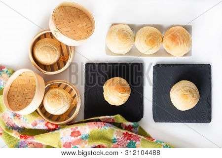 Oriental Food Concept Homemade Organic Huaiyang Spiral Chinese Flaky  Pastry Moon Cake On White Back