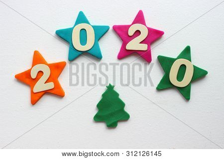 2020 Background .the Concept Of The New 2020. New Year With Colorful Numbers 2020 On White Backgroun