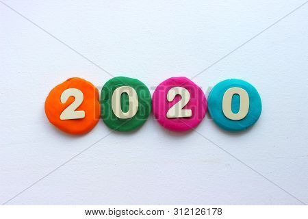 2020 Background .the Concept Of The New 2020. New Year With Colorful Numbers 2020 On White Backgroun