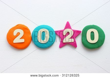 2020 Background .the Concept Of The New 2020. New Year With Colorful Numbers 2020 On White Backgroun