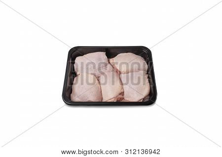 Chicken Thigh. Fresh, Raw Chicken Thigh In The Package. Closeup Of Chicken Meat. Procurement For Des