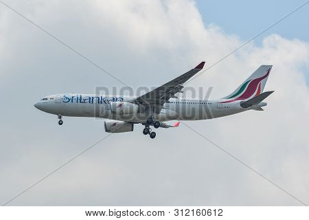 Passenger Airplane Landing At The Airport