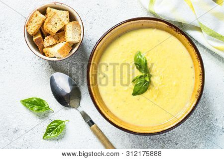 Zucchini Cream Soup With Basil And Croutons. Top View On White. Diet Food, Meatless Dish.