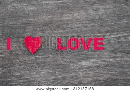 Love With Heart. Red Hearts On Vintage Wooden Table Top View
