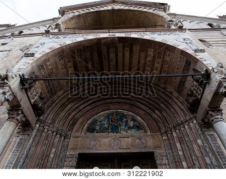 Cathedral Of Verona, External Romanesque Architecture With Bestiaries Carved In Marble