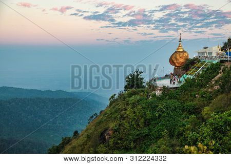 Kyaiktiyo Pagoda Also Known As Golden Rock Is A Well-known Buddhist Pilgrimage Site In Myanmar, Nigh
