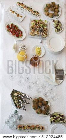 Food For A Buffet On The Table Top View. Snacks. A Festive Table With Dishes And Drinks.