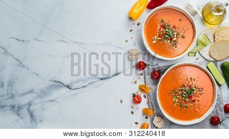 Gaspacho Soup On White Marble Tabletop. Two Bowls Of Traditional Spanish Cold Soup Puree Gaspacho Or