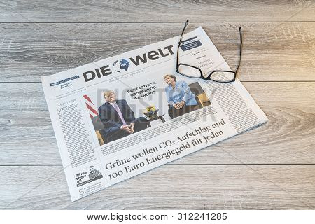 Frankfurt Am Main, Germany. June 29, 2019.  The Lecture Of The Die Welt German Newspaper On A Wooden