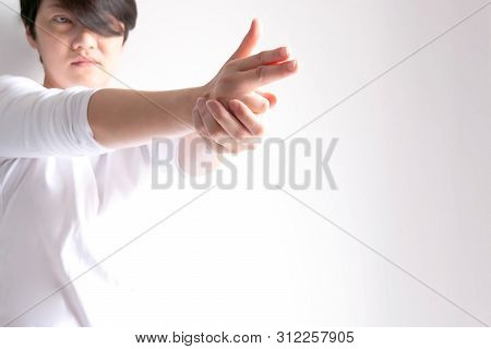 A Caucasian Woman Join Two Hands To Be Shotgun Shape Aim At Target At Front On White Background; Con