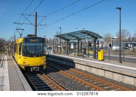 Utrecht, The Netherlands - February 26, 2019: Tram Station With With Waiting Woman In Nieuwegein