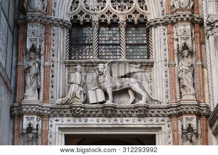 Venice, Italy - May 18, 2018: This Is A Fragment Of Paper Gate Portal Of  The Doges Palace With A Sc
