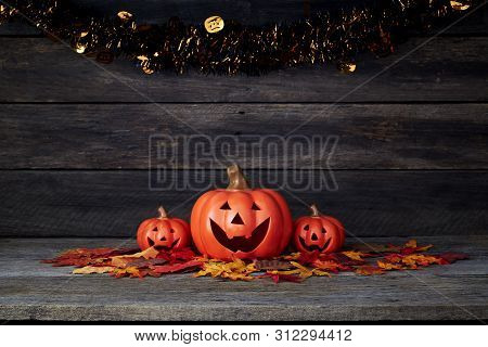 Halloween Pumpkin Lantern. Trick Or Treat On A Wooden Table