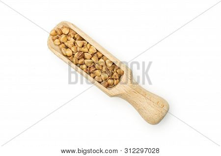 Lot Of Whole Raw Brown Buckwheat Grain With Wooden Scoop Flatlay Isolated On White Background