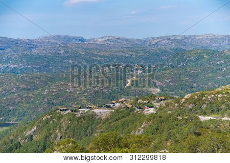 Small Vacation Houses In The Southern Part Of Norway, Along The Famous Lysevegen (lyse Road).