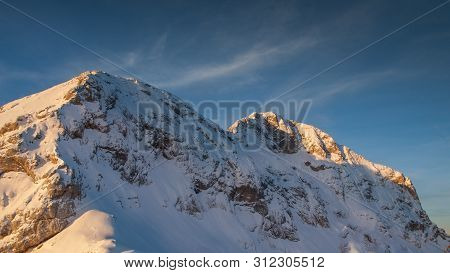 Landscape View Of Mali Triglav In Front And Triglav Behind From The Mountain Hut Kredarica. Winter I
