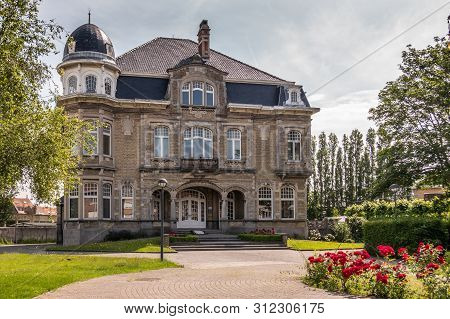 Knokke-heist, Flanders, Belgium -  June 18, 2019: Kursaalstraat. Historic Brown-gray Building Of Pro