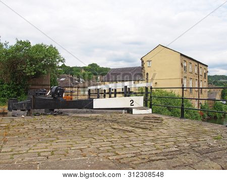 A Close Up Of Wooden Lock Gates On The Calder Hand Hebble Navigation Canal In Front Of The Basin In 